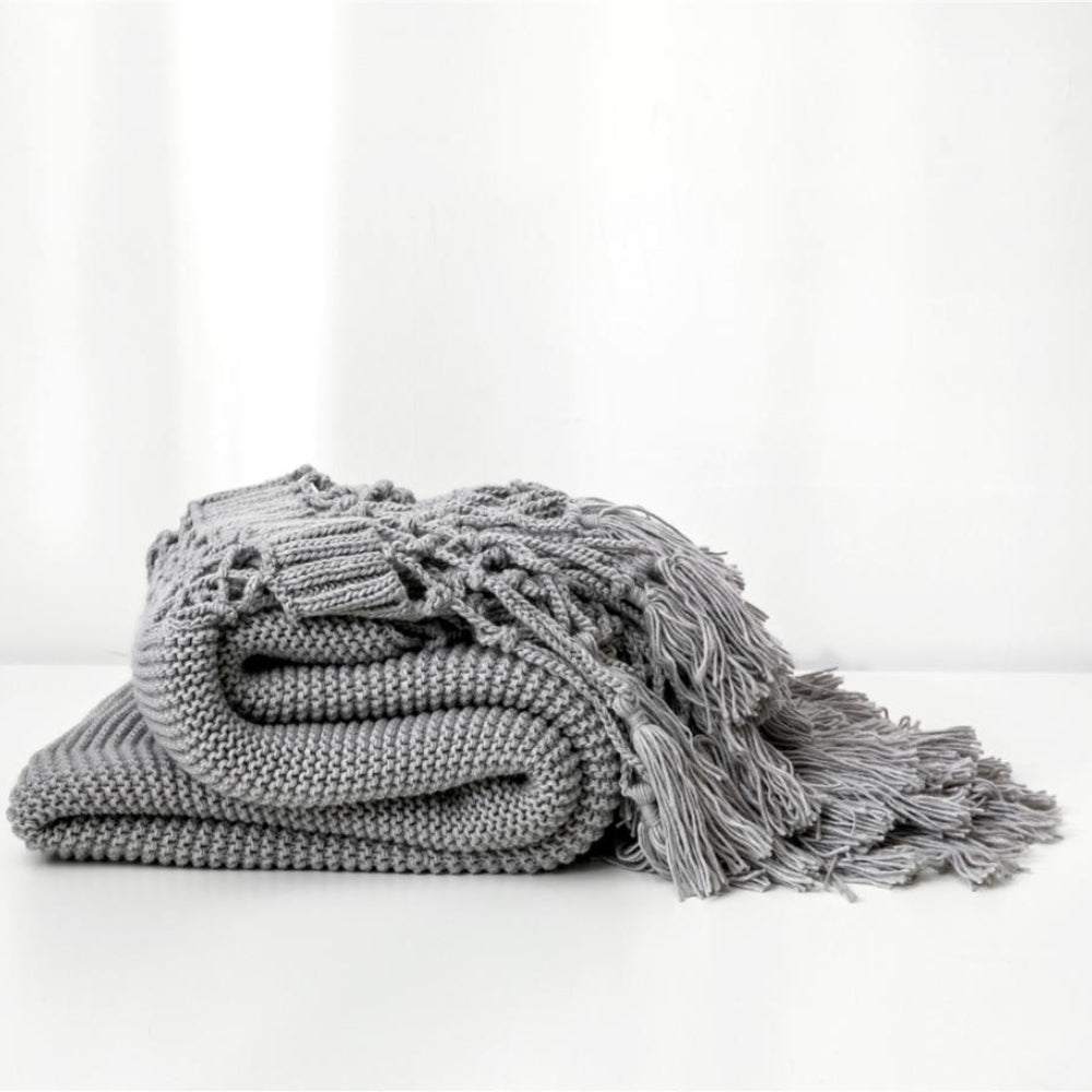 Snug Knit Woven Tassel Blanket